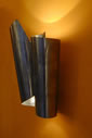Modern wall lighting design in stainless steel. Sconce lighting design really provides unique decorating accents to your décor.